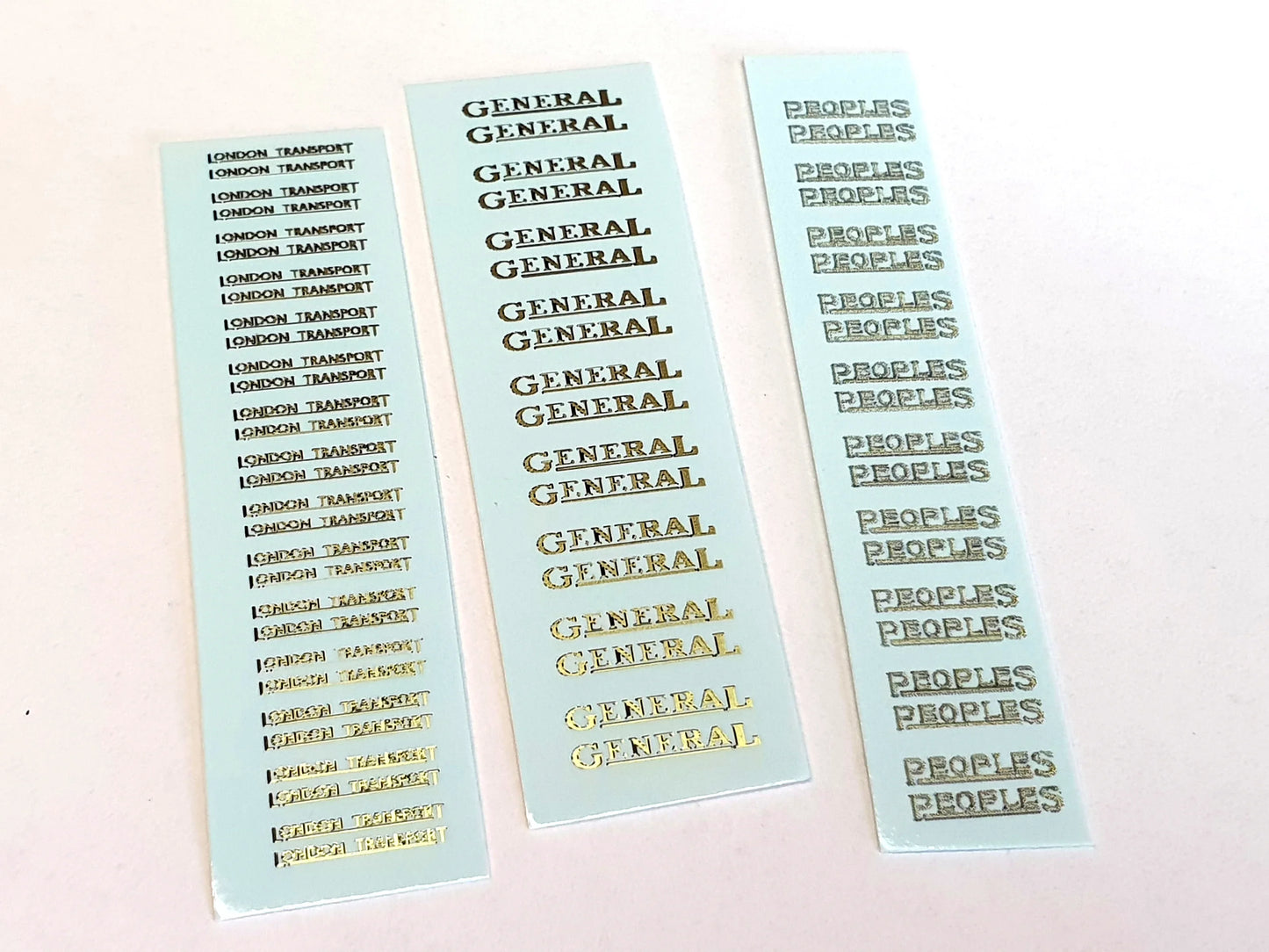 Examples of our N scale, waterslide transfers for the Thornycroft bus model. From left to right is "London Transport", "General" and "Peoples" - Three Peaks Models