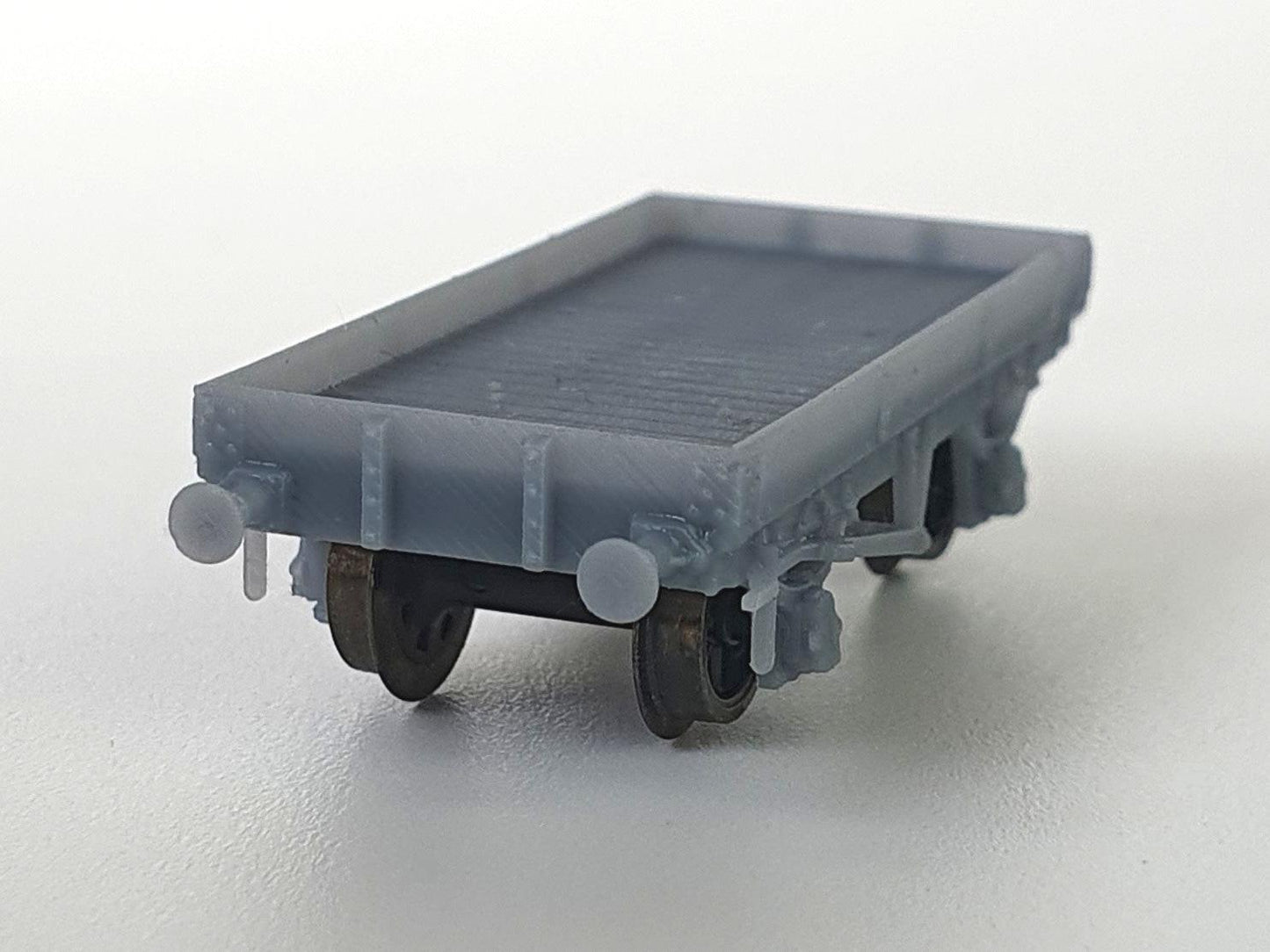 N (1:148) scale model of an L&Y Diagram 1 Low Goods wagon viewed from the end - Three Peaks Models