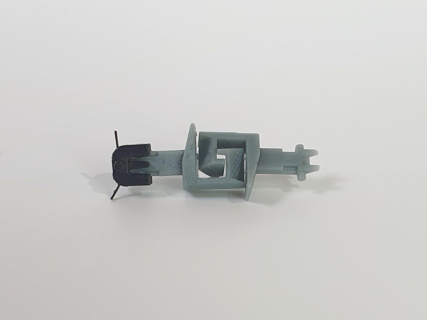 Coupled pair of NEM 356 357 Rapido style couplers placed in a third party NEM 355 pocket - Three Peaks Models