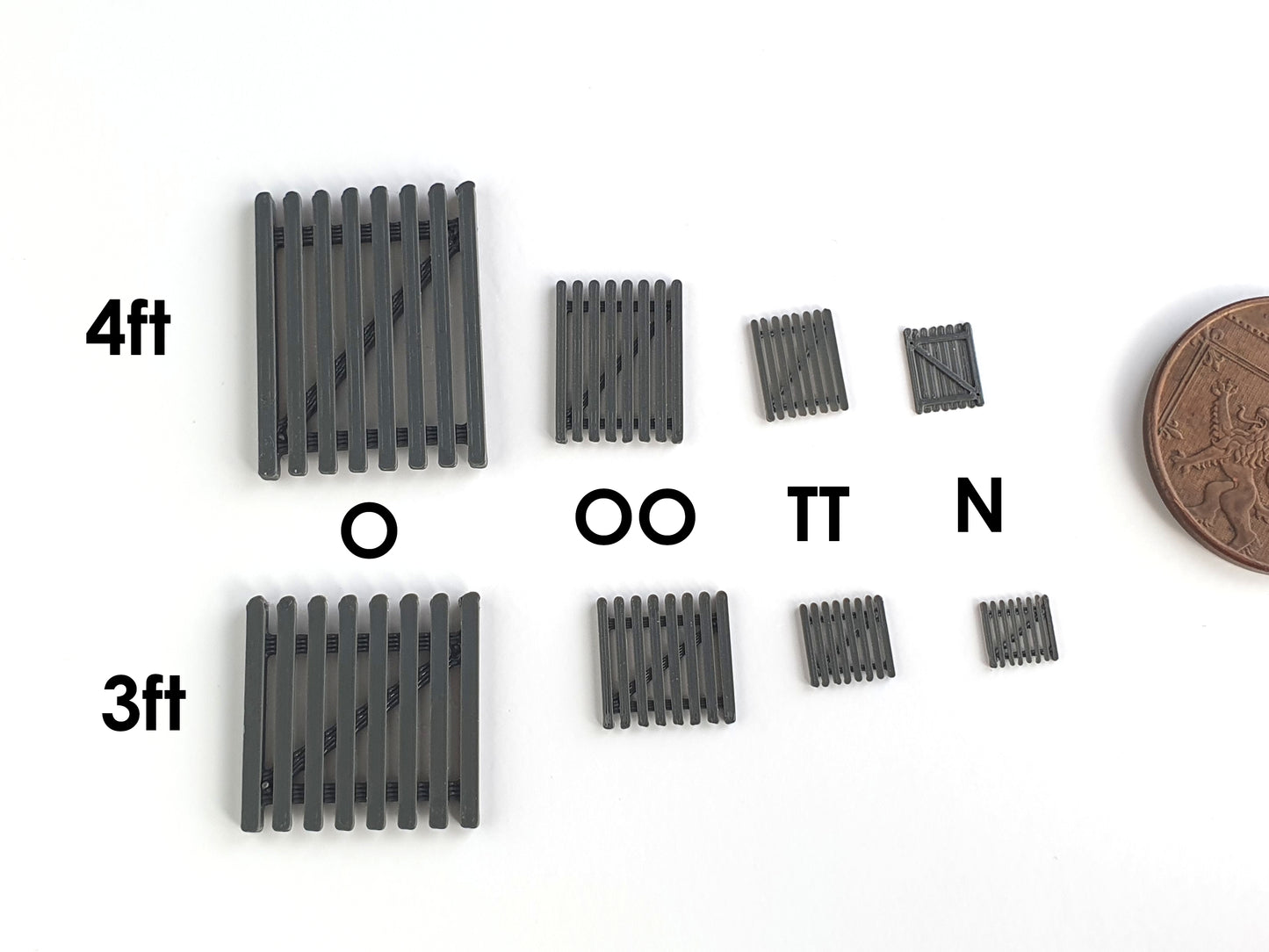 Scale model picket gate of various heights and different scales, with text labels - Three Peaks Models