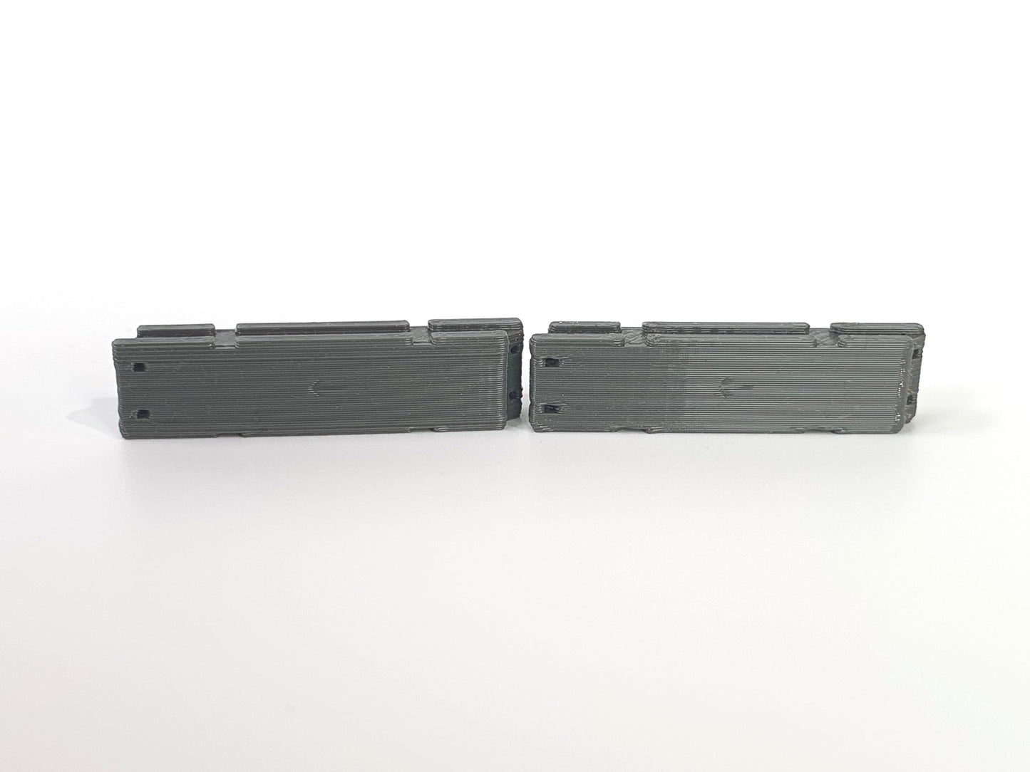 TT120 scale model temporary vertical concrete barrier with arrows pointing left - Three Peaks Models