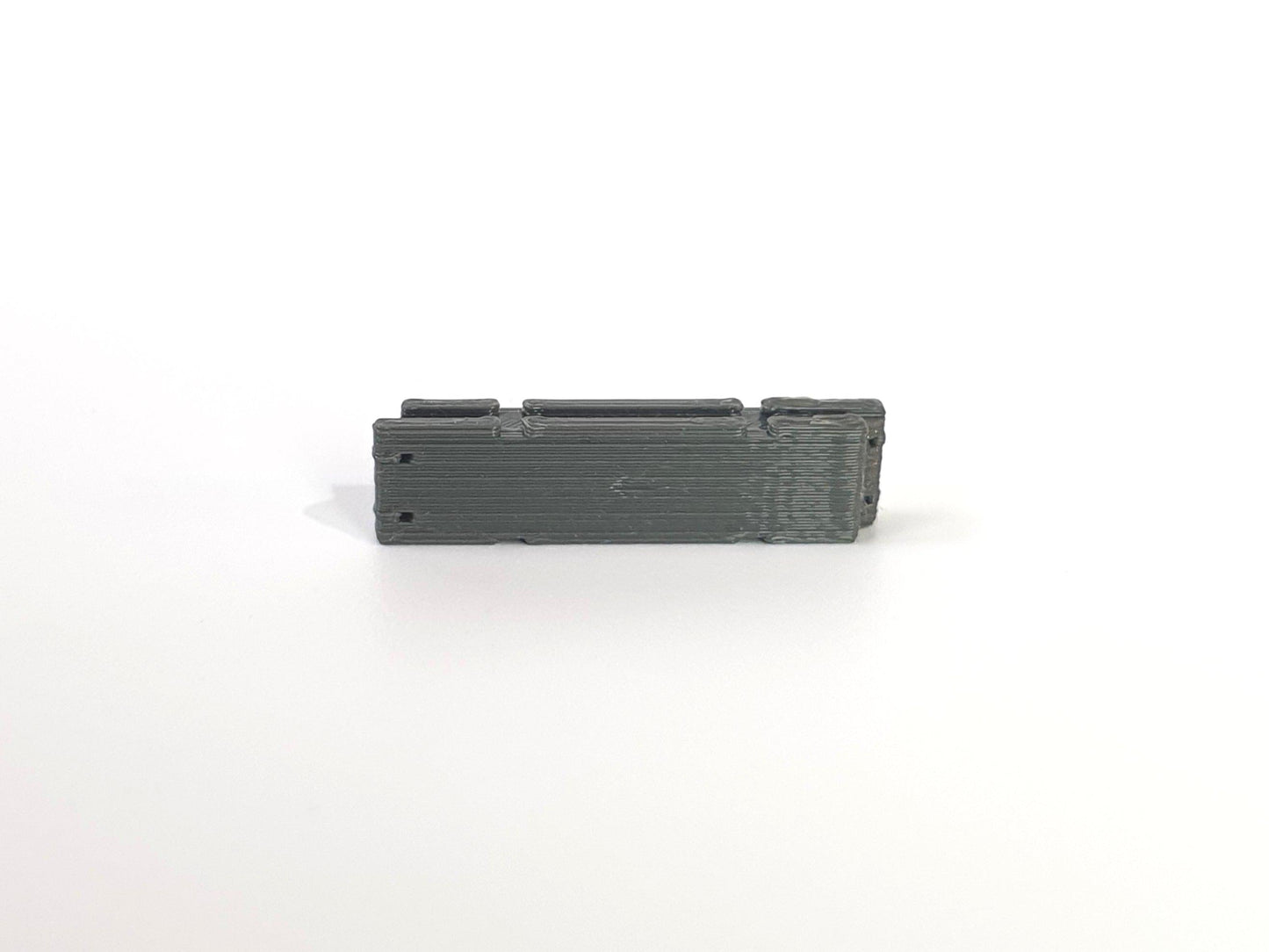 N gauge scale model temporary vertical concrete barrier with arrows pointing left - Three Peaks Models