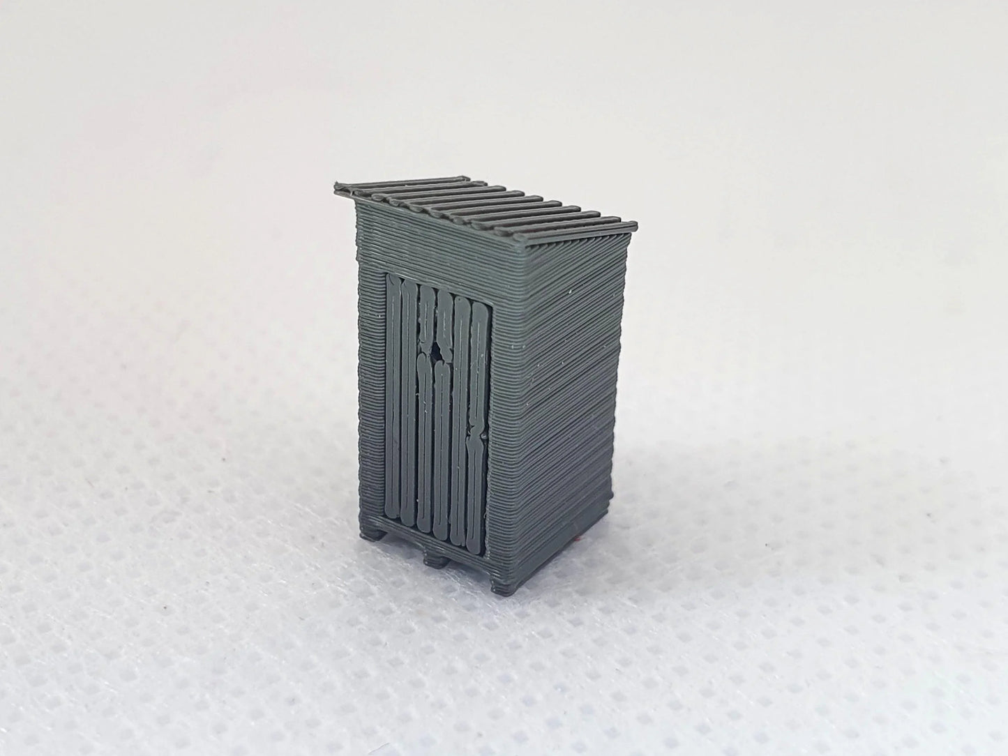 N gauge scale model of an outside toilet with the door shut - Three Peaks Models