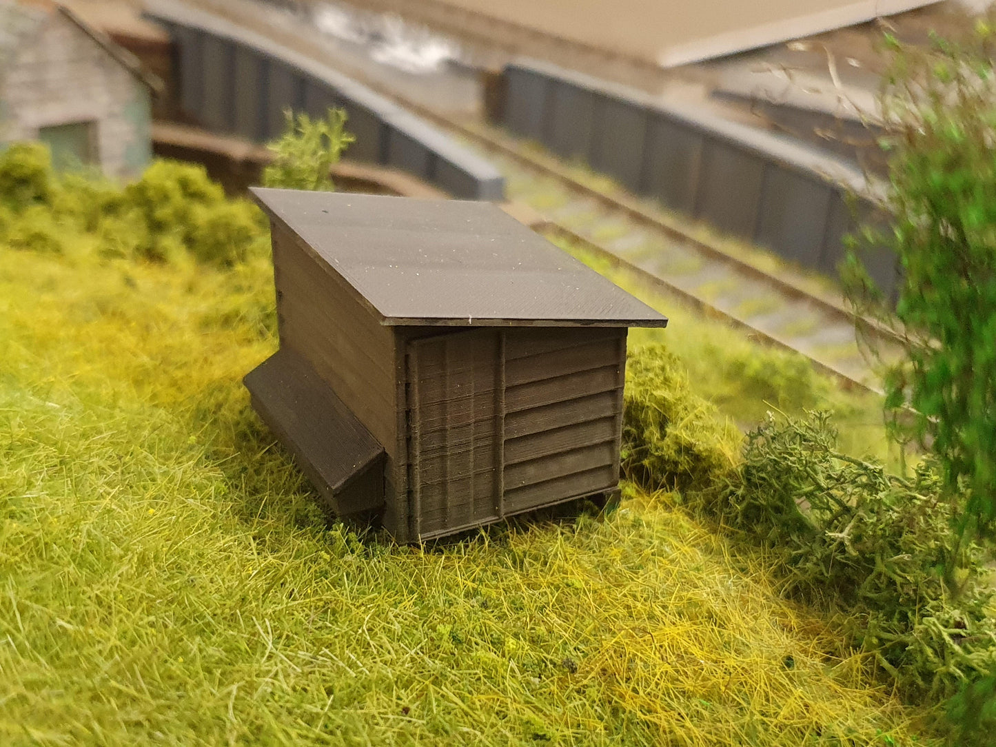 Front view of a scale model of a chicken coop in OO scale - Three Peaks Models