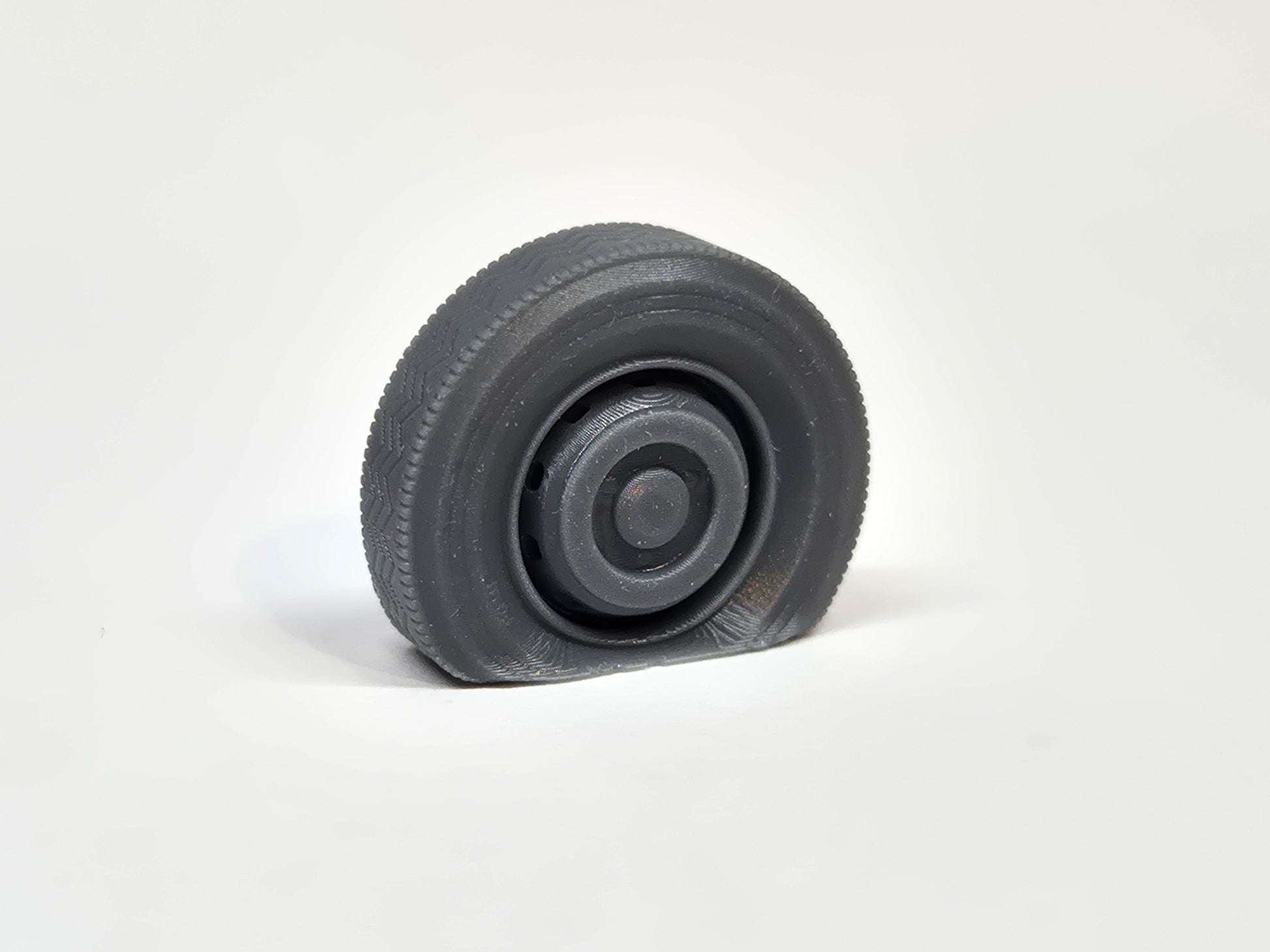 1:50 scale model flat front tyre on a Leyland bus wheel - Three Peaks Models