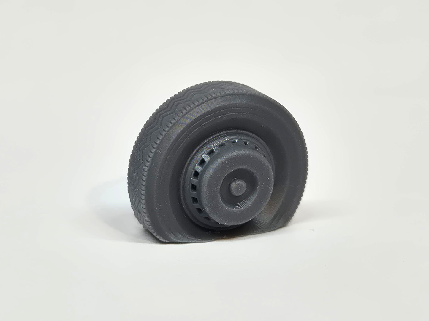 O (1:43) scale model flat front tyre on a Duple coach wheel - Three Peaks Models