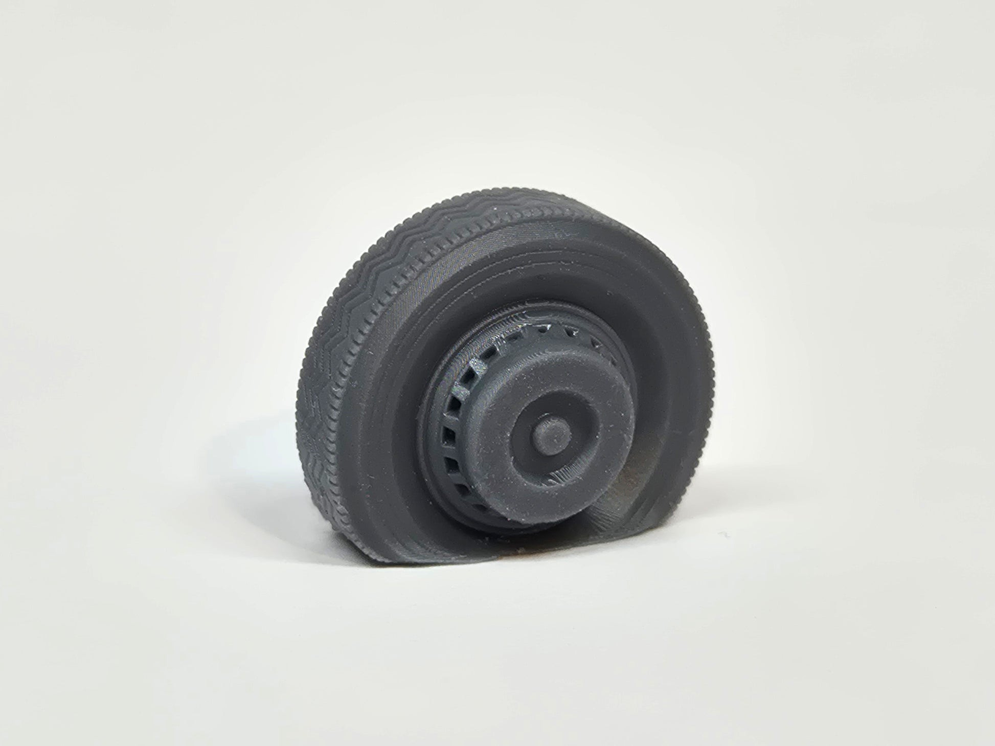 O (1:43) scale model flat front tyre on a Duple coach wheel - Three Peaks Models