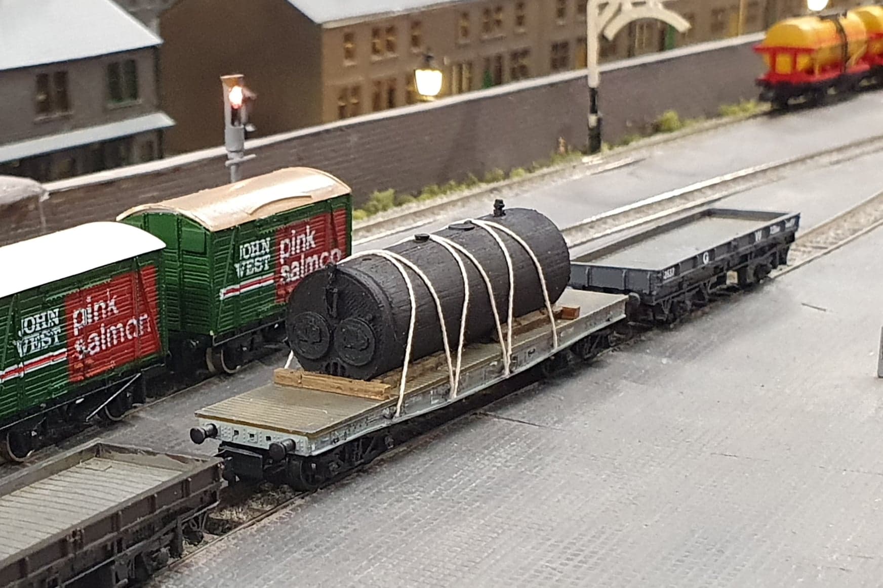 Painted Lancashire boiler strapped to a wagon in place on a railway layout - Three Peaks Models