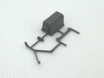 Parts of a OO gauge scale model of aerial ropeway bucket attaqched to the sprues - Three Peaks Models.