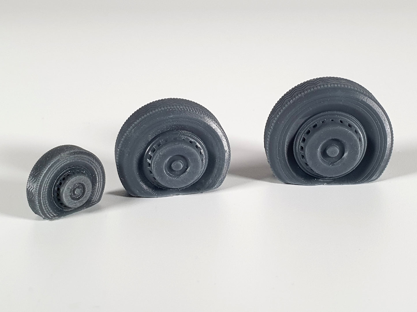 Various size scale model flat front tyres on Duple coach wheels - Three Peaks Models