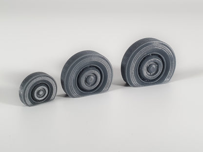 Various size scale model flat front tyres on Leyland bus wheels - Three Peaks Models