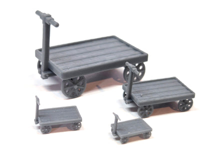 Set of 4 scale model unpainted platform trolleys in different scales - Three Peaks Models